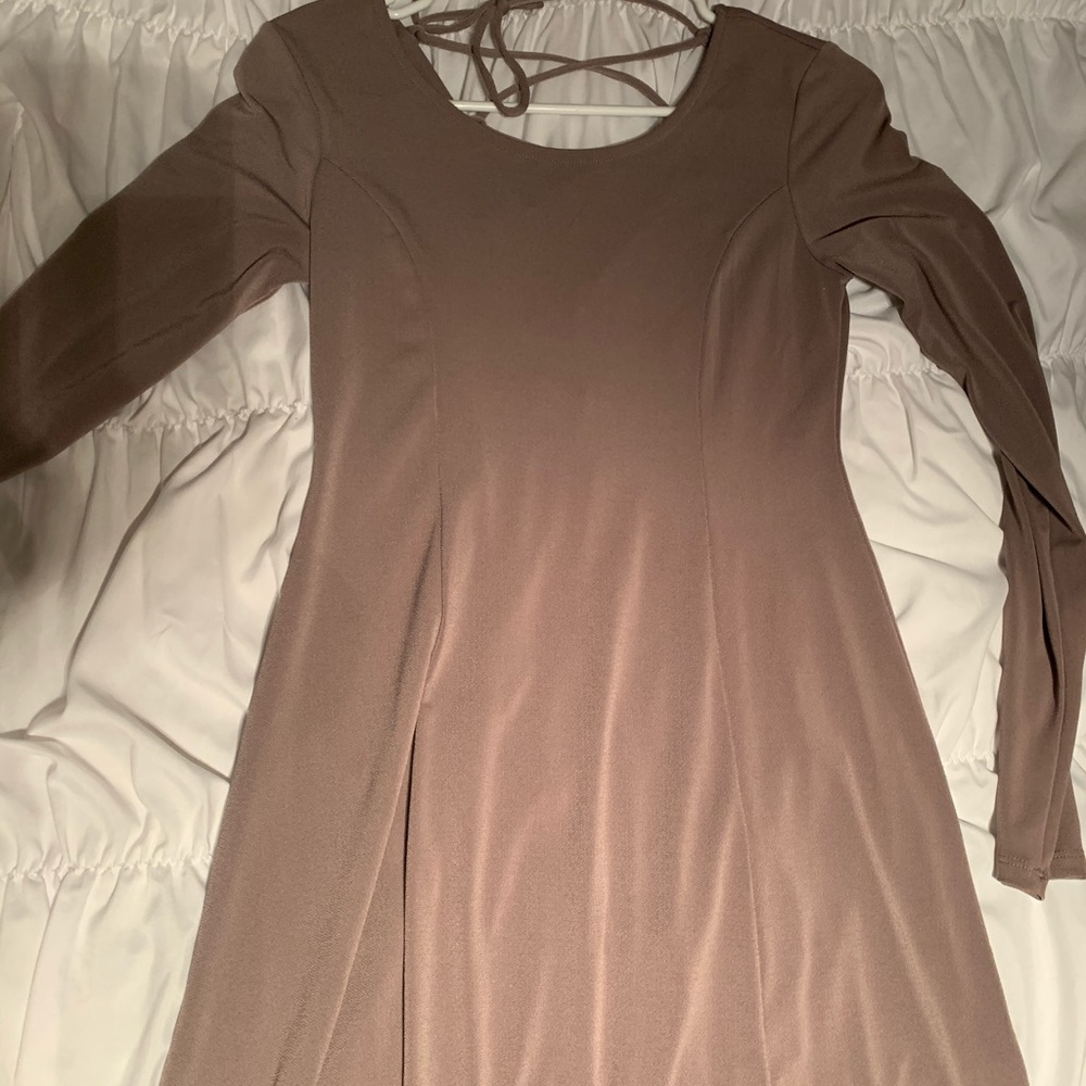 Tight taupe colored dress with cross back